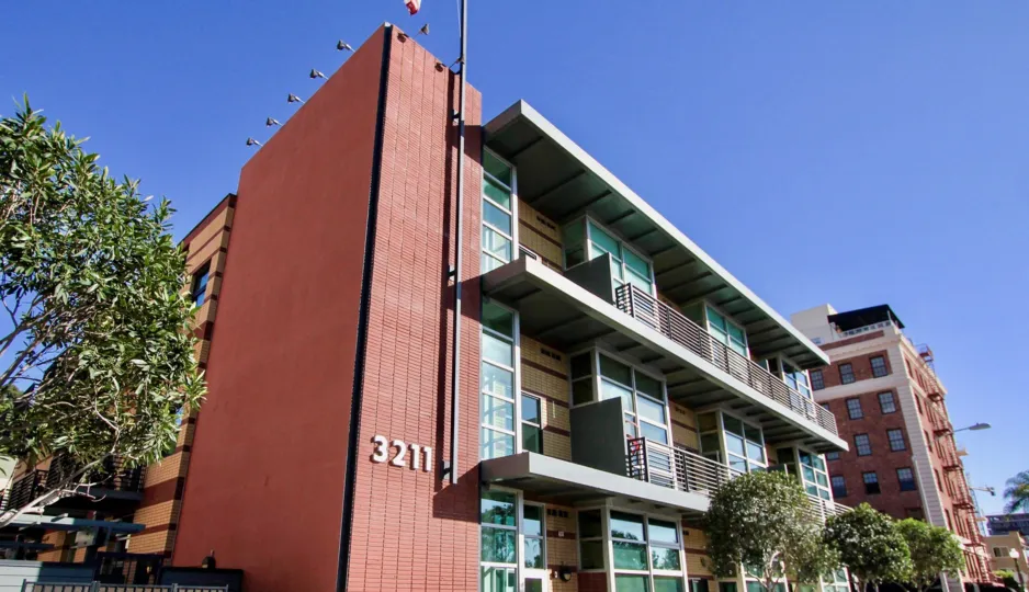 Villa with trees on a sunny day in Fifth Avenue Lofts of Hilcrest