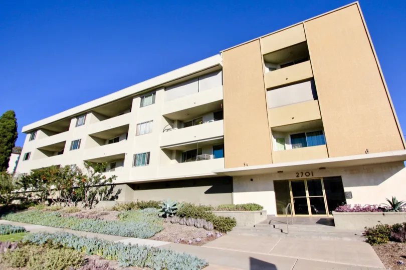 A sunny day in the Laurel Hill with residential building and plants.