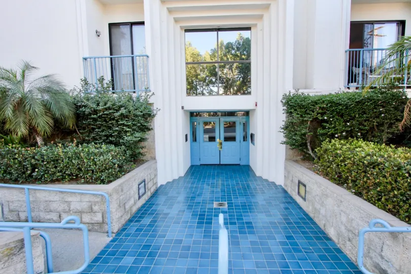 The Floor of pathway to the Apartment is made with blue marbles in Le Parc Chateau