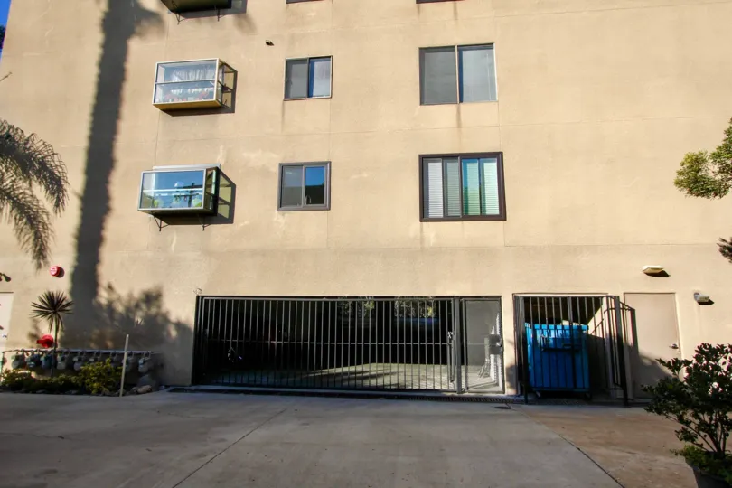 Inside the apartment in Maple Front has garbage box and in outside has flower pots and plants