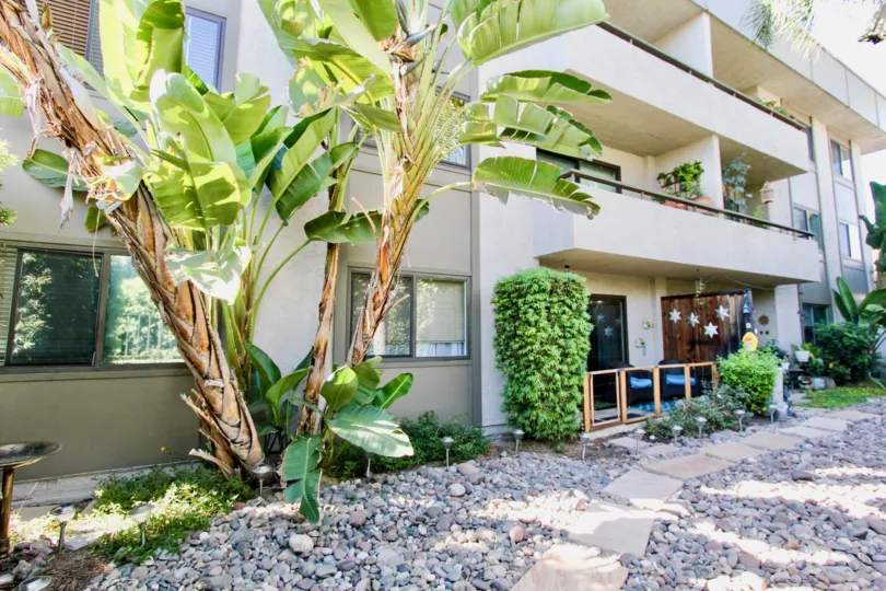 Excellent view of Villa with banana trees and garden on a sunny day of Mission Crest Gardens in Hillcrest