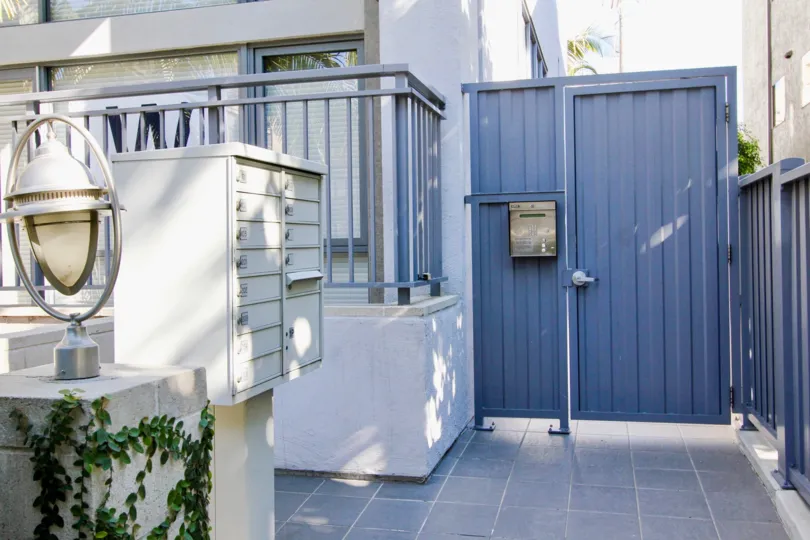 An apartment with blue gate in Montana Lofts neighborhood.