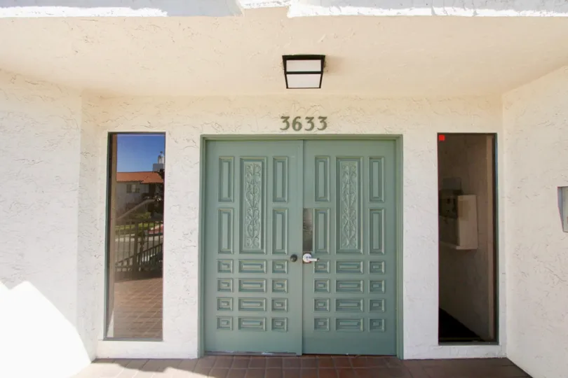 An entrance of a building in the Park Terrace with verity door.