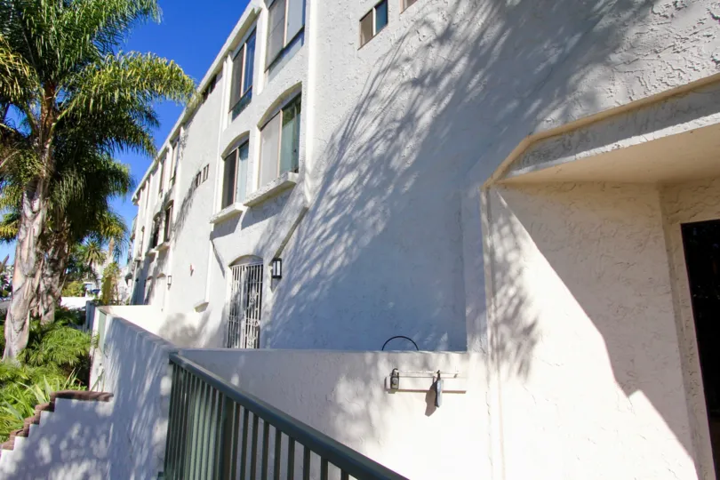 Three-storey apartments with white stucco walls in the Park Terrace neighborhood.