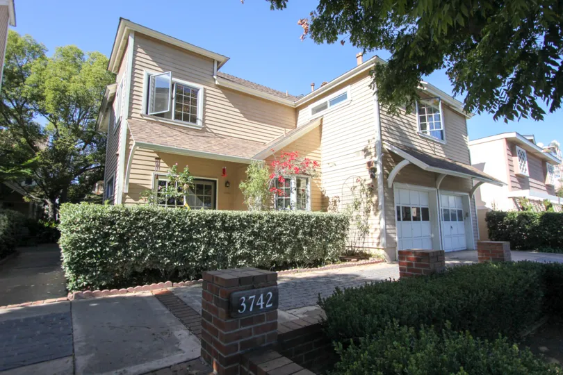Awesome outside view of a villa with trees and sunshine with lawn in Peppercorn of Hillcrest