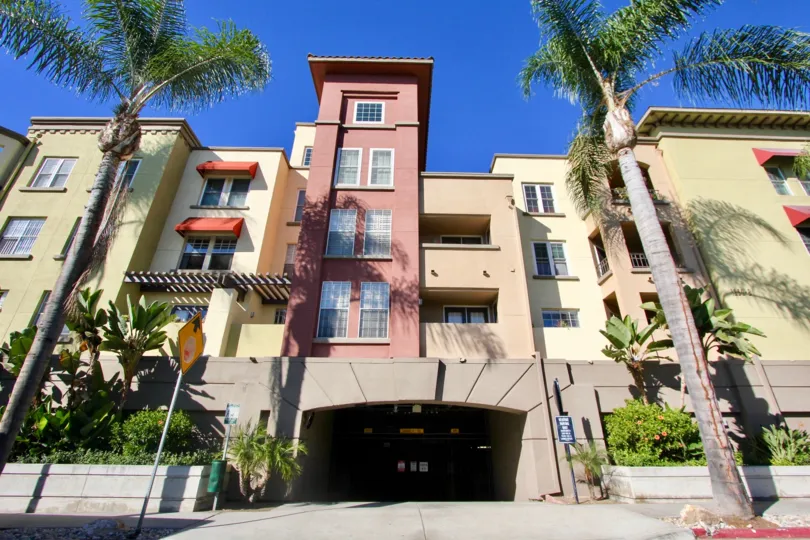 A multi-color low-rise housing unit in Uptown District neighborhood.
