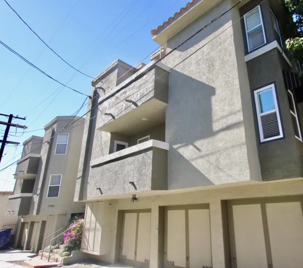Bright sunny day in Uptown Villas West with villas having balcony in Hilcrest