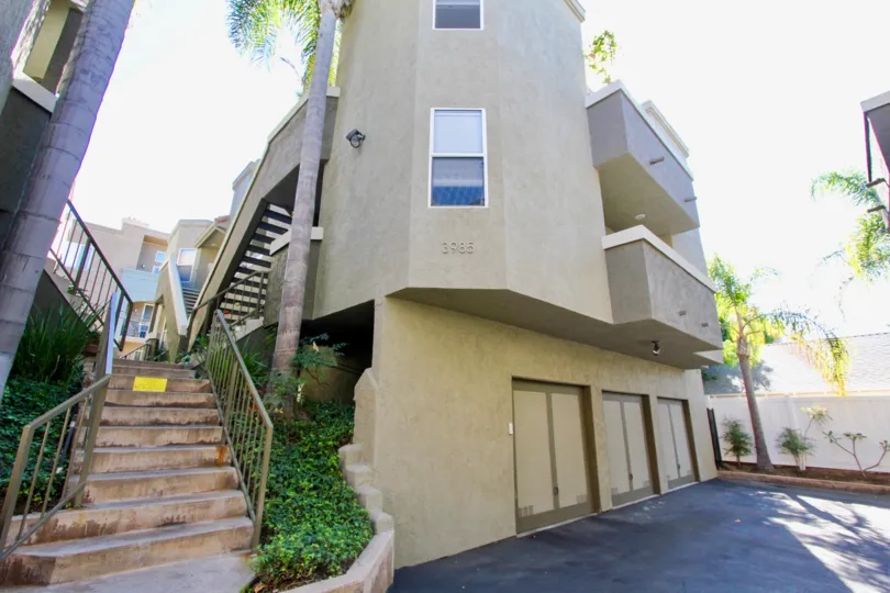 THE 3985 APARTMENT IN THE UPTOWN VILLAS WEST WITH THE UPSTAIRS, PLANTS, TREES, DOORS