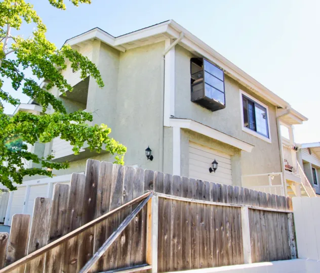 Fence and windws of an apartment in Vantage II Community in Hillcrest, CA.
