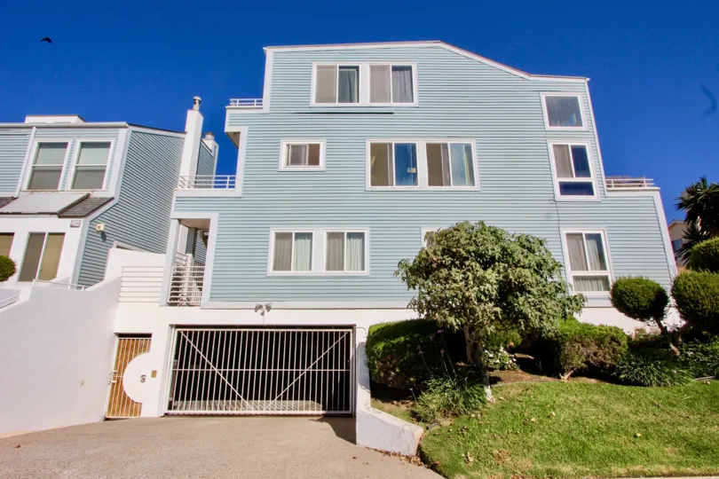 Three story housing with underground parking at Coastwalk Townhomes in Imperial Beach California