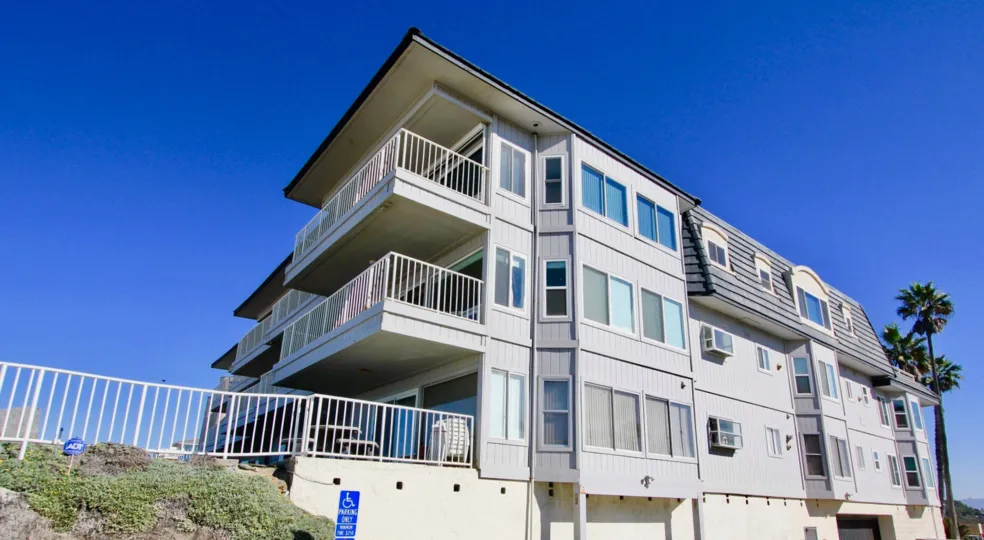 Multiple level housing that has balconies on each floor in Cortez community.
