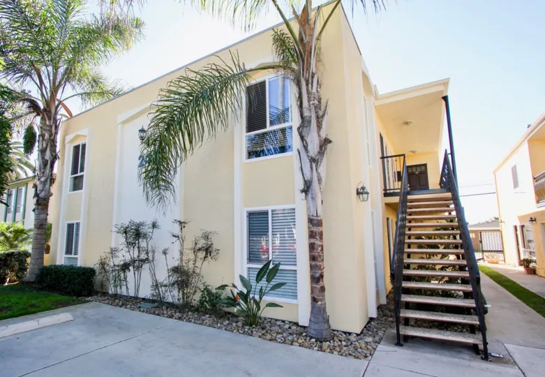 Two story residential building with stairs at Ebony Estates in Imperial Beach CA