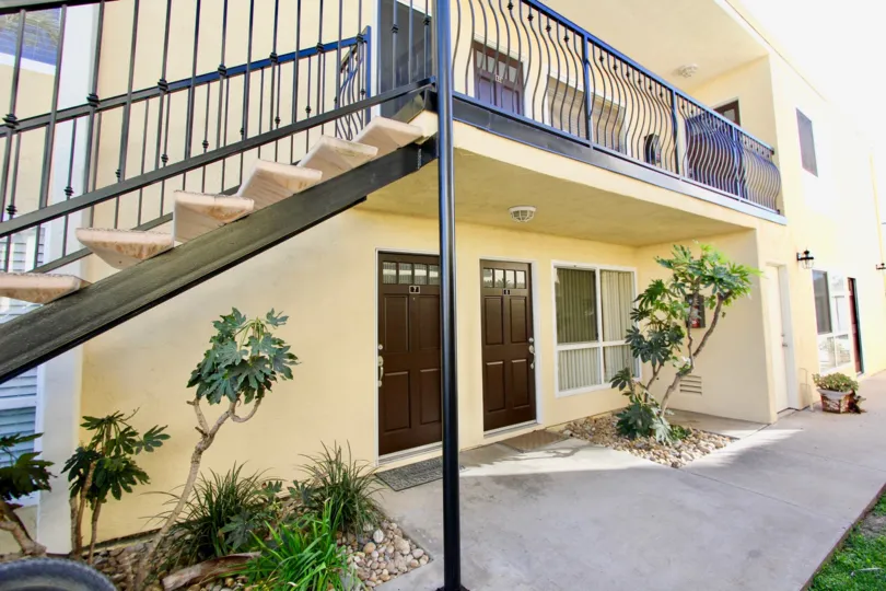 Two story housing with attached stairway at Ebony Estates in Imperial Beach California