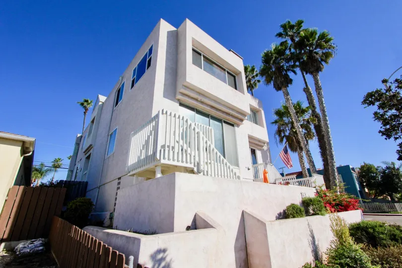Three story housing with palm trees at Las Mareas in Imperial Beach California