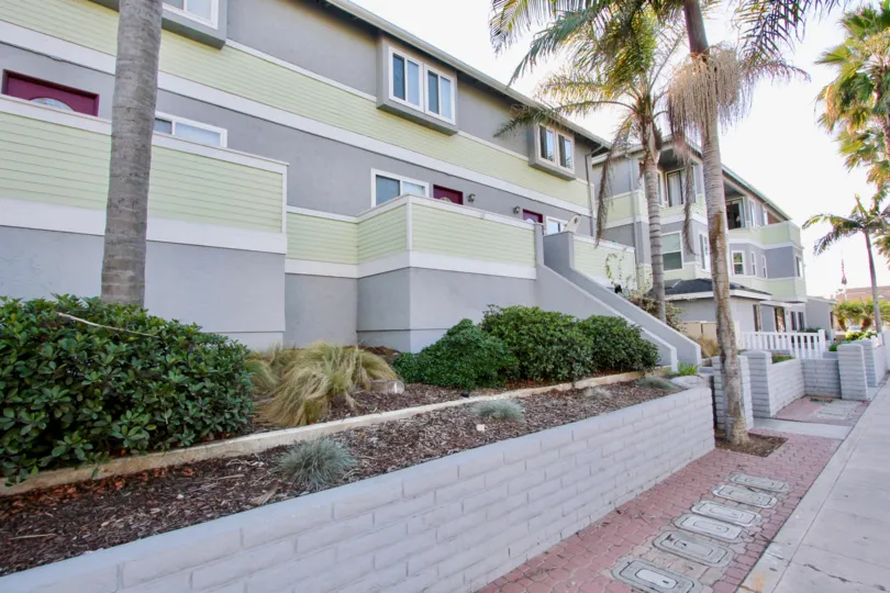 A residence that is painted to draw attention located in Palm Plaza.