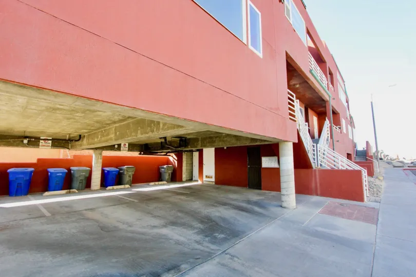 A bright red building's parking lot in Imperial Beach California