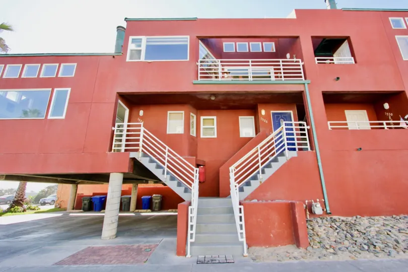 Three story building with stairway at Sandcastle Cove in Imperial Beach CA