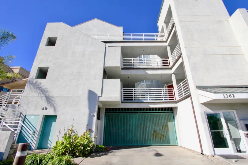 Three story residential building with underground parking at Sea Ranch in Imperial Beach California