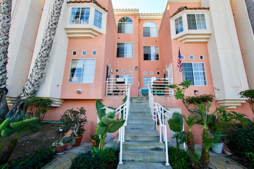 Three story housing with stairway at Seaside Villas in Imperial Beach California