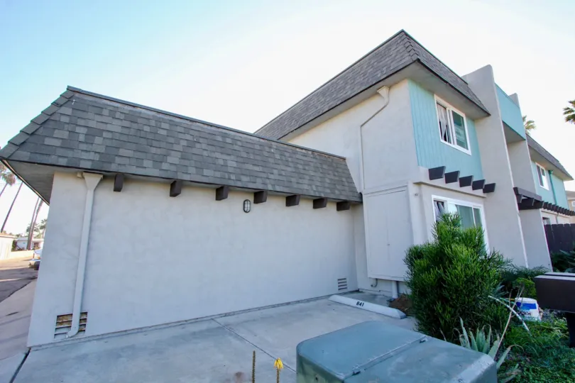 Three story residential units near street at Silverstrand Gardens in Imperial Beach California