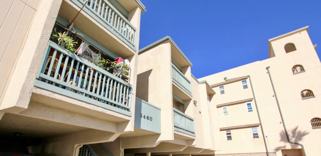 Balcony decorated with the plants and flower in Surf & Sand Condominiums