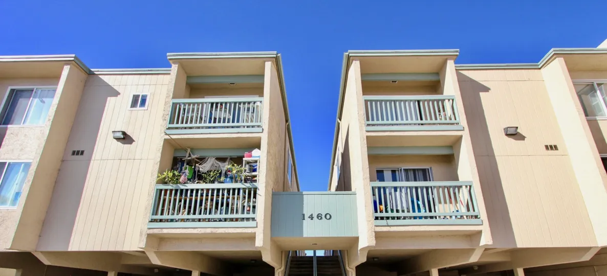 Outer view of the building in Surf & Sand Condominiums with front view of building.