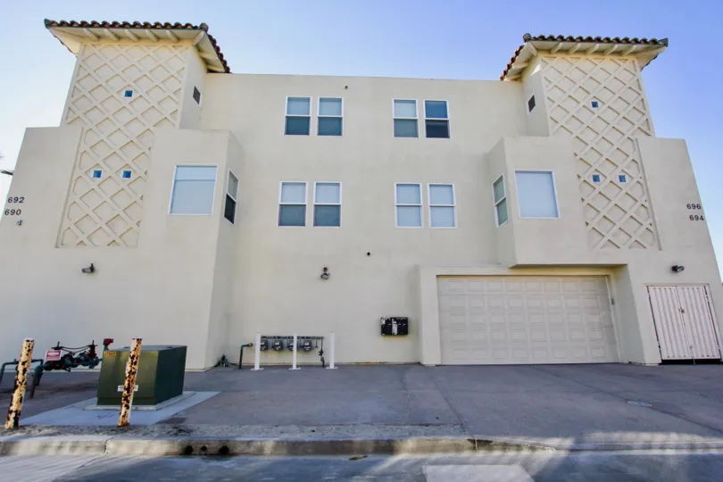 A two-storey apartment block with ground-level garage in the Wavecrest community of Imperial Beach, CA