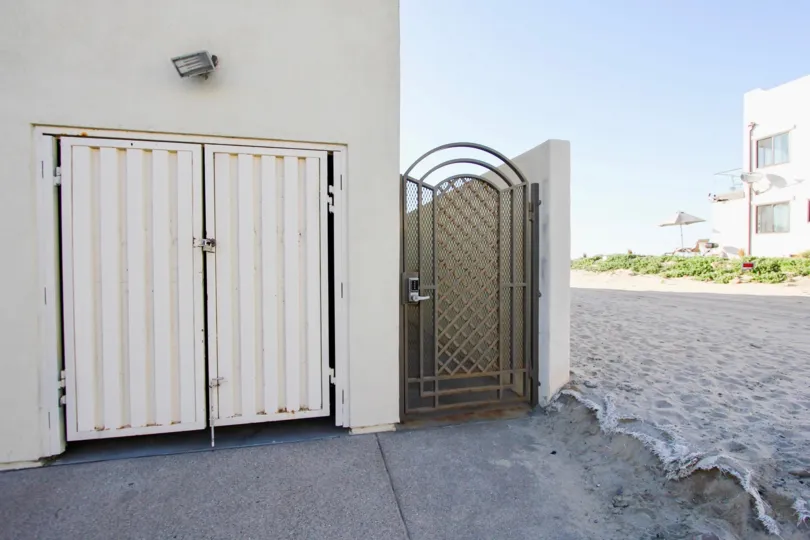 Security gate next to residential unit at Wavecrest in Imperial Beach California