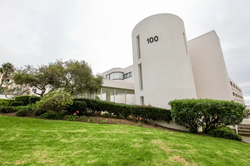 Large white silo style building at 100 Coast in La Jolla California