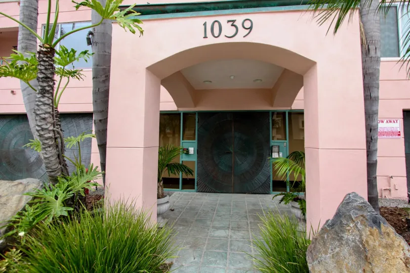 A front view of Villa Number with Garden trees in 1039 Coast Blvd South of La Jolla