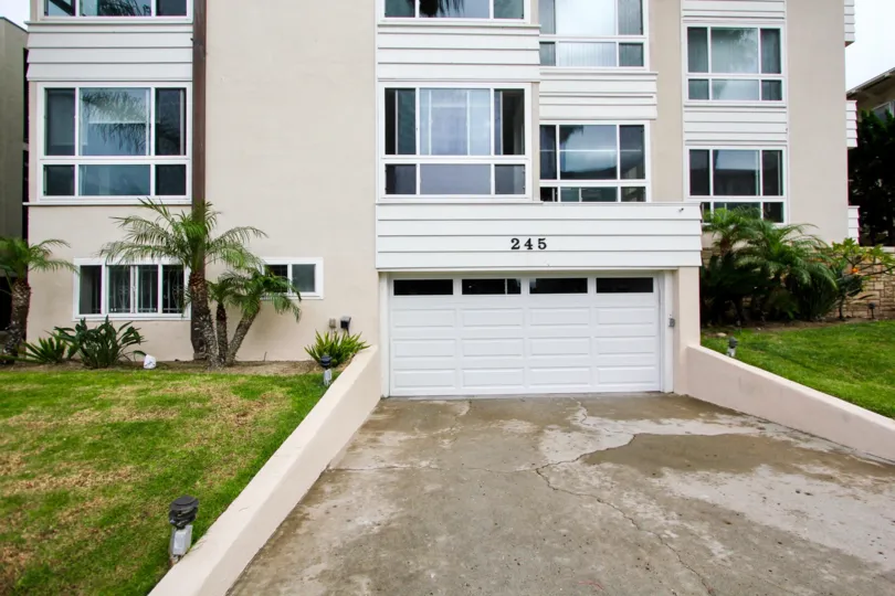 Pink housing with built in garage inside 245 Coast in La Jolla CA