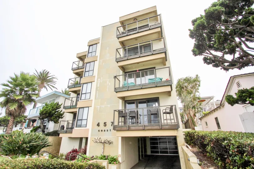 457 Coast's five story residential units near trees in La Jolla California