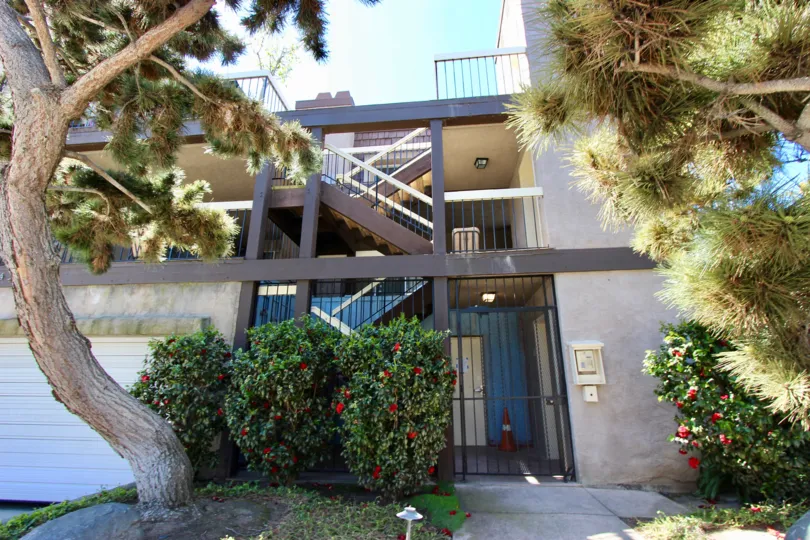 The ornate entranceway with teal awning of 7434 Herschel, La Jolla, California