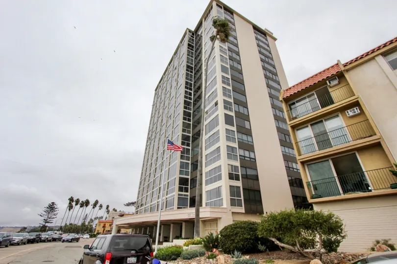 Residential high rise wit tall American flag at 939 Coast in La Jolla CA