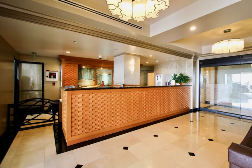 The reception hall in the 939 coast and has sofa and lift