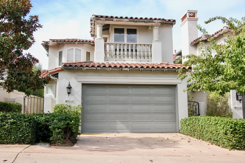 Gray garage door on a home inside Blackhorse in La Jolla California