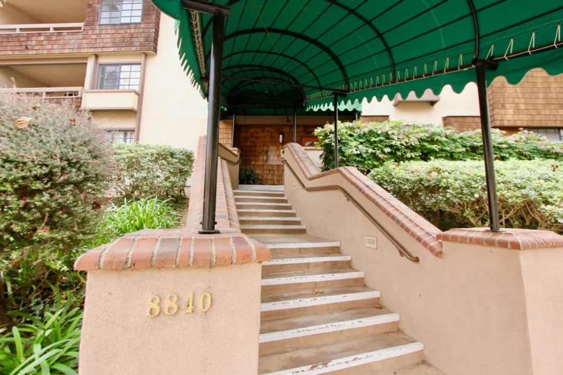 The coverage in the stairs to the apartments indicates a number 8840