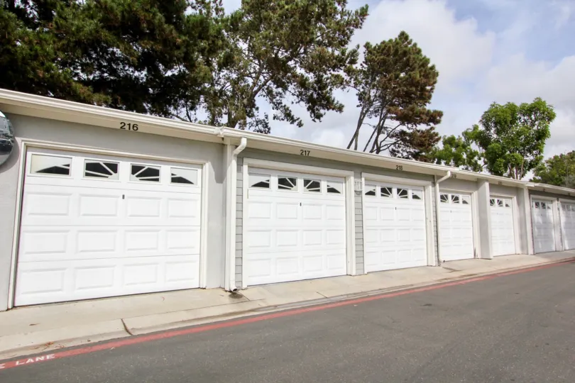 Cape La Jolla Gardens row of white garages near driveway in La Jolla California