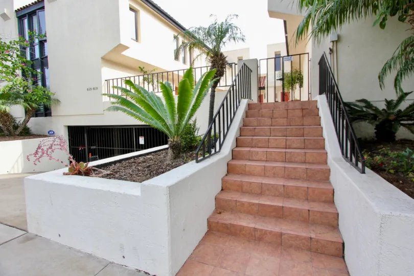 White lovely home with staircase in Casa Del Grande, La Jolla CA
