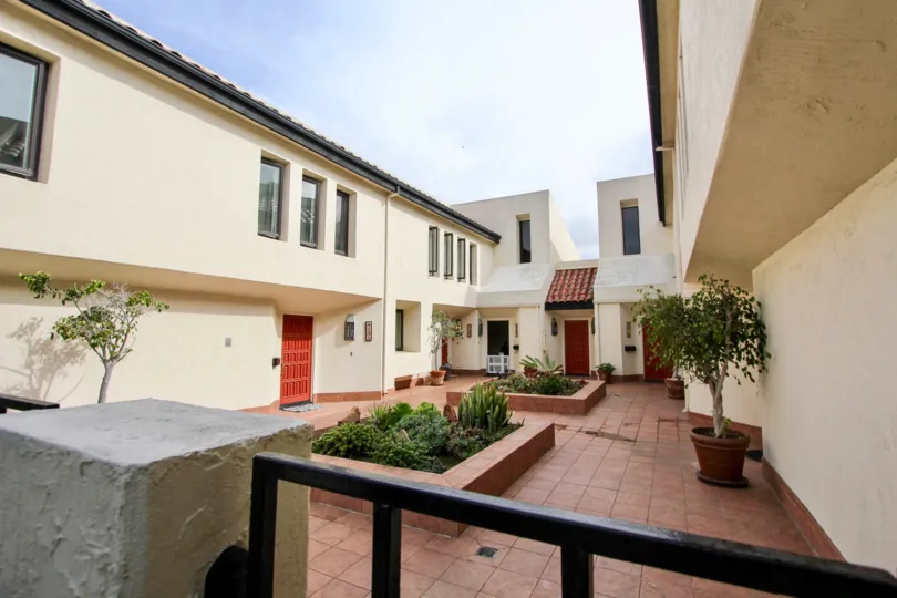 Pink tile floor between residential units at Casa Del Grande at La Jolla CA