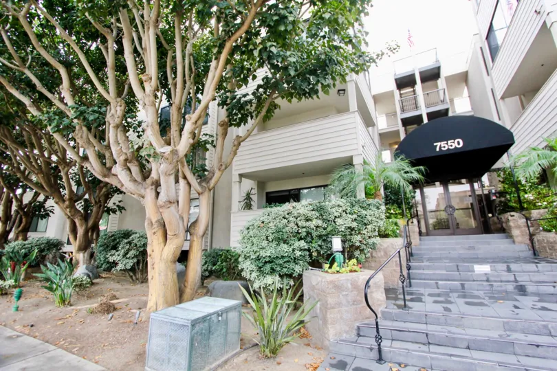 Posh group home with sculptured trees of Clinton Manor.
