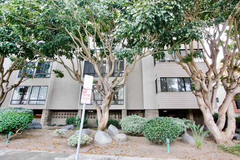 Tall gray residential units inside Clinton Manor at La Jolla California