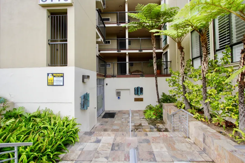 Clubdoniniums Apartments looks neat with small garden