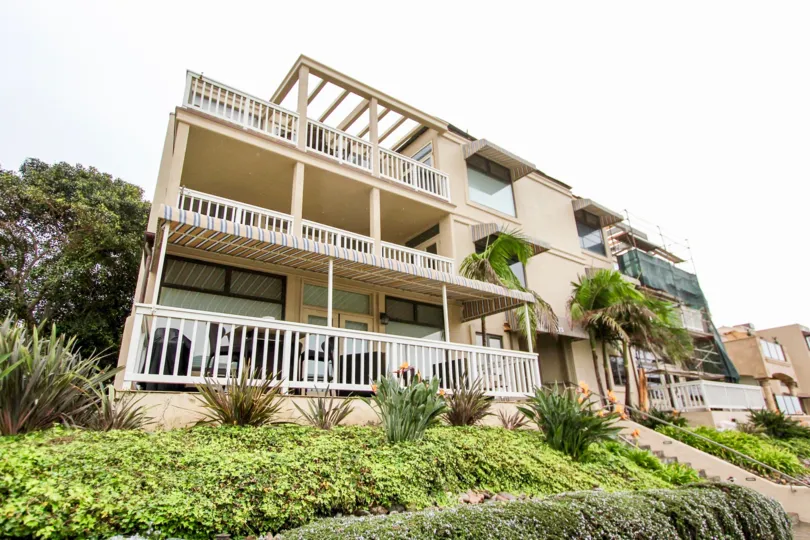 The outside area of Coast Pointe community is covered with number of plants