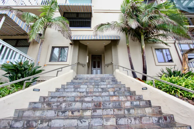 Shiny stone steps leading to entrance at Coast Pointe in La Jolla CA