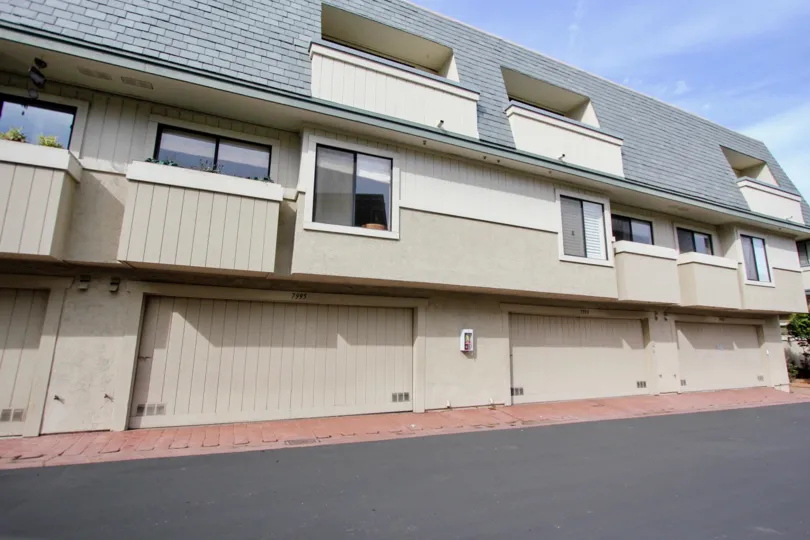 A building with all garages on the first floor located in Del Charro Woods community.