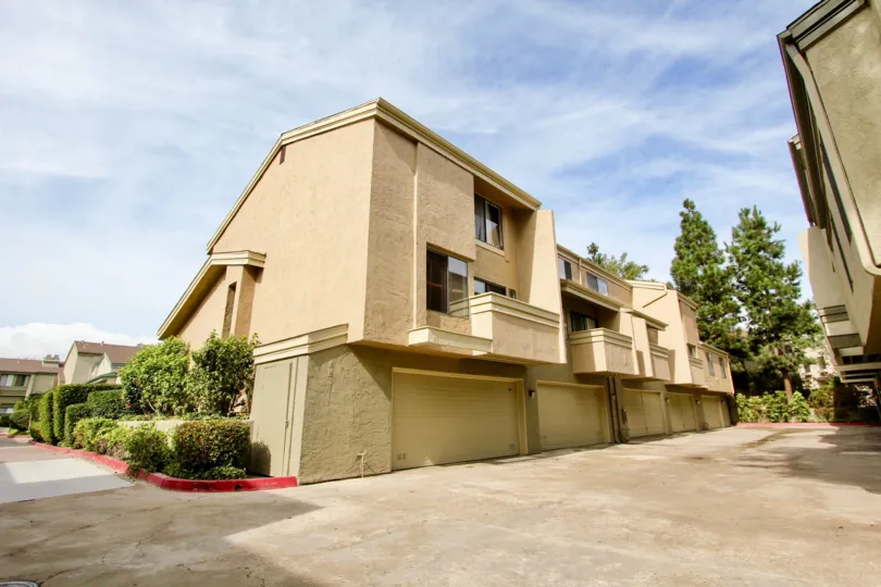 Three story brown condominiums inside the Eastbluff community in La Jolla CA