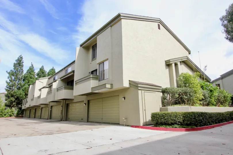 Three story housing with white garages at Eastbluff in La Jolla CA