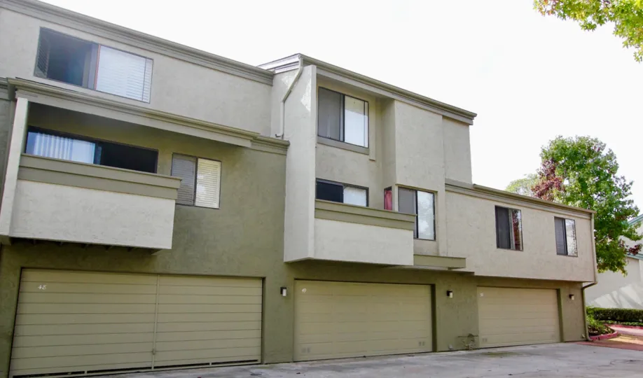 Three story housing with garages & windows inside Eastbluff in La Jolla CA