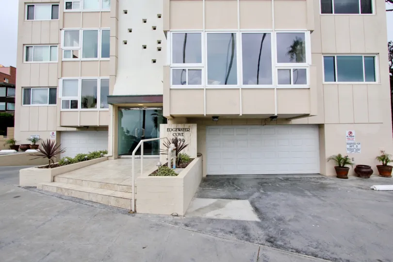 Wet driveway & garage in Edgewater Cove at La Jolla CA